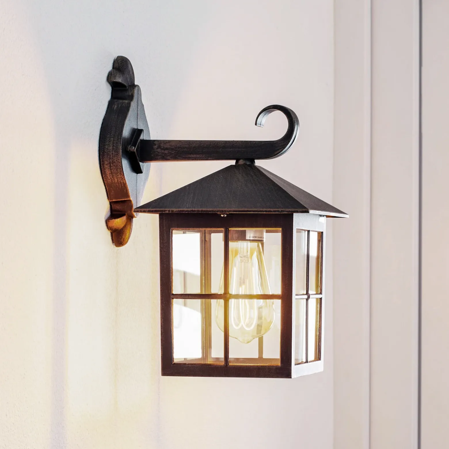 Aplique de exterior Ida de Lindby, color óxido, farol, 34 cm, E27