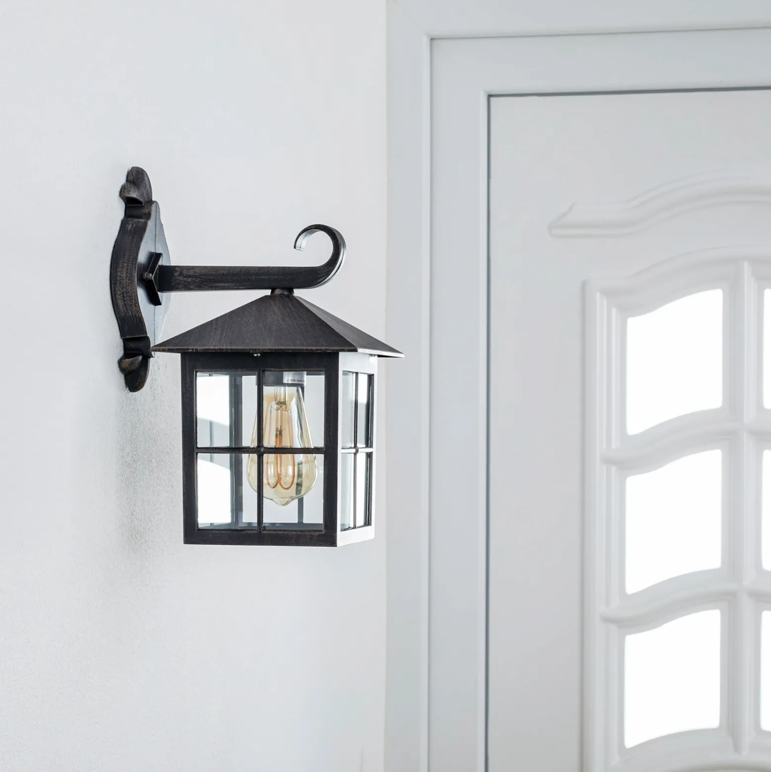 Aplique de exterior Ida de Lindby, color óxido, farol, 34 cm, E27