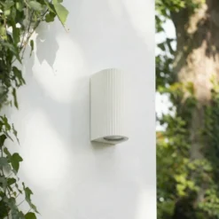 Aplique de exterior Lindby Aluvo, blanco, 16 cm, IP65, estriado