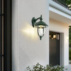 Aplique de exterior Lindby Clint, verde, luz hacia abajo, IP44