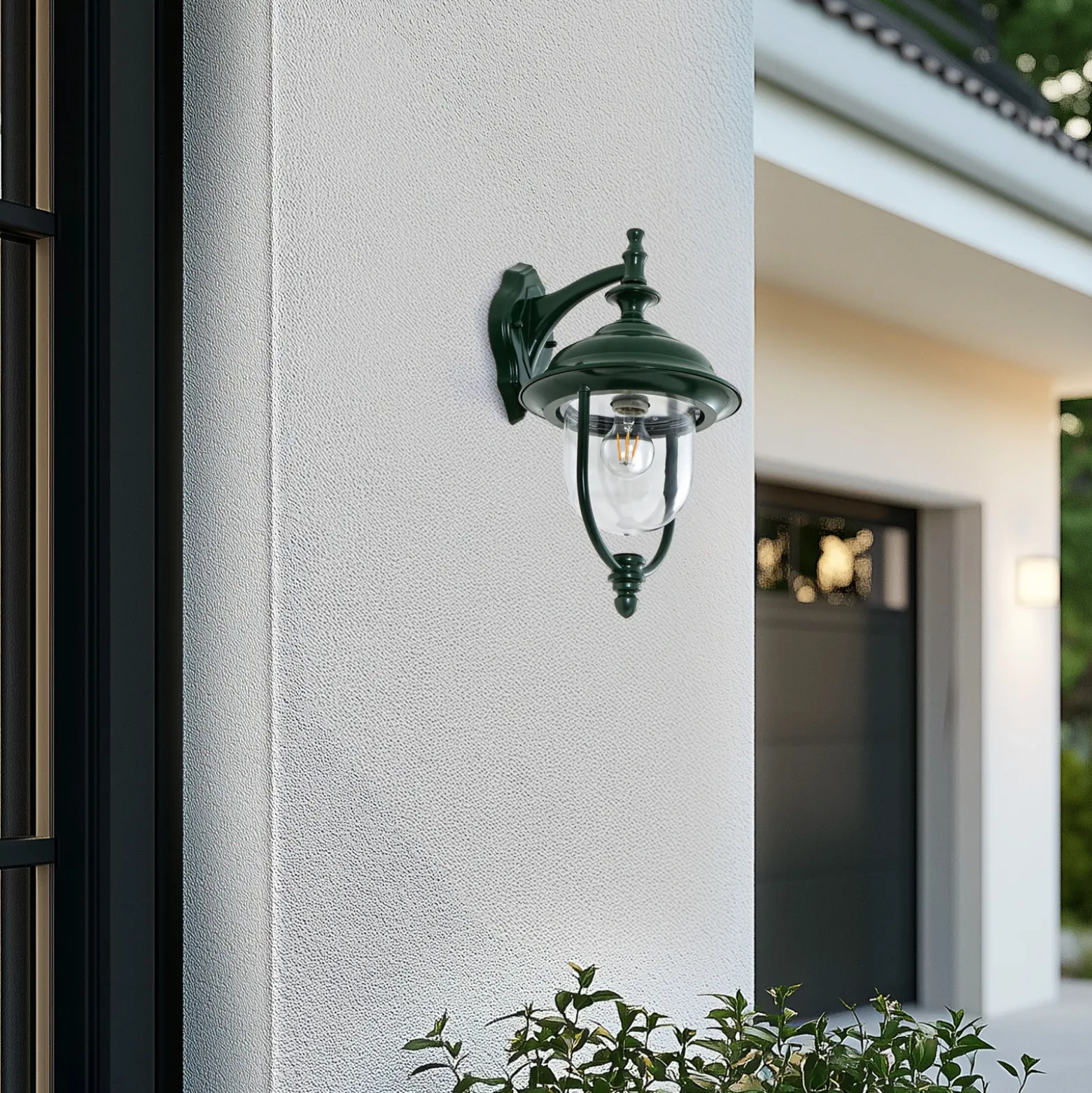 Aplique de exterior Lindby Clint, verde, luz hacia abajo, IP44