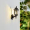 Aplique de exterior Lindby Nane, con sensor, farol, resistente al agua salada