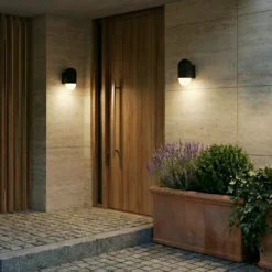 Aplique de exterior Lindby Pilva, negro, metal, IP44, E27