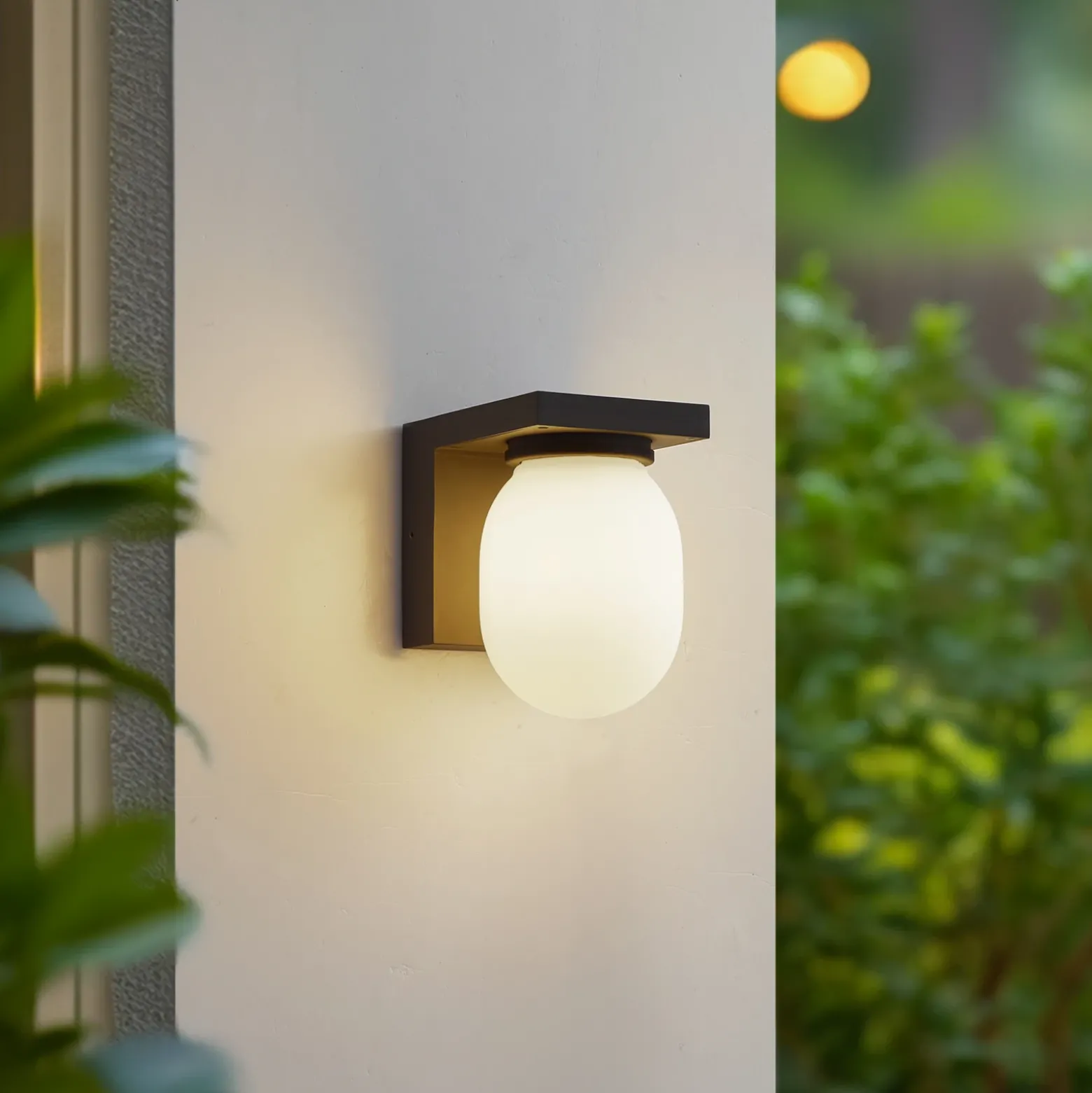 Aplique de exterior Lucande Ovaali, cristal, gris oscuro, IP65