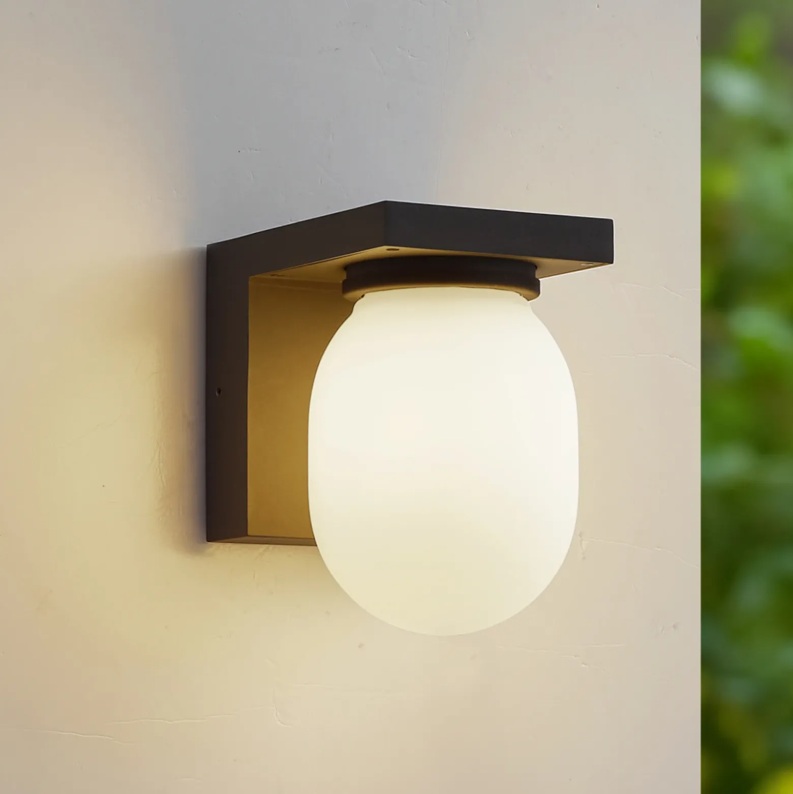 Aplique de exterior Lucande Ovaali, cristal, gris oscuro, IP65