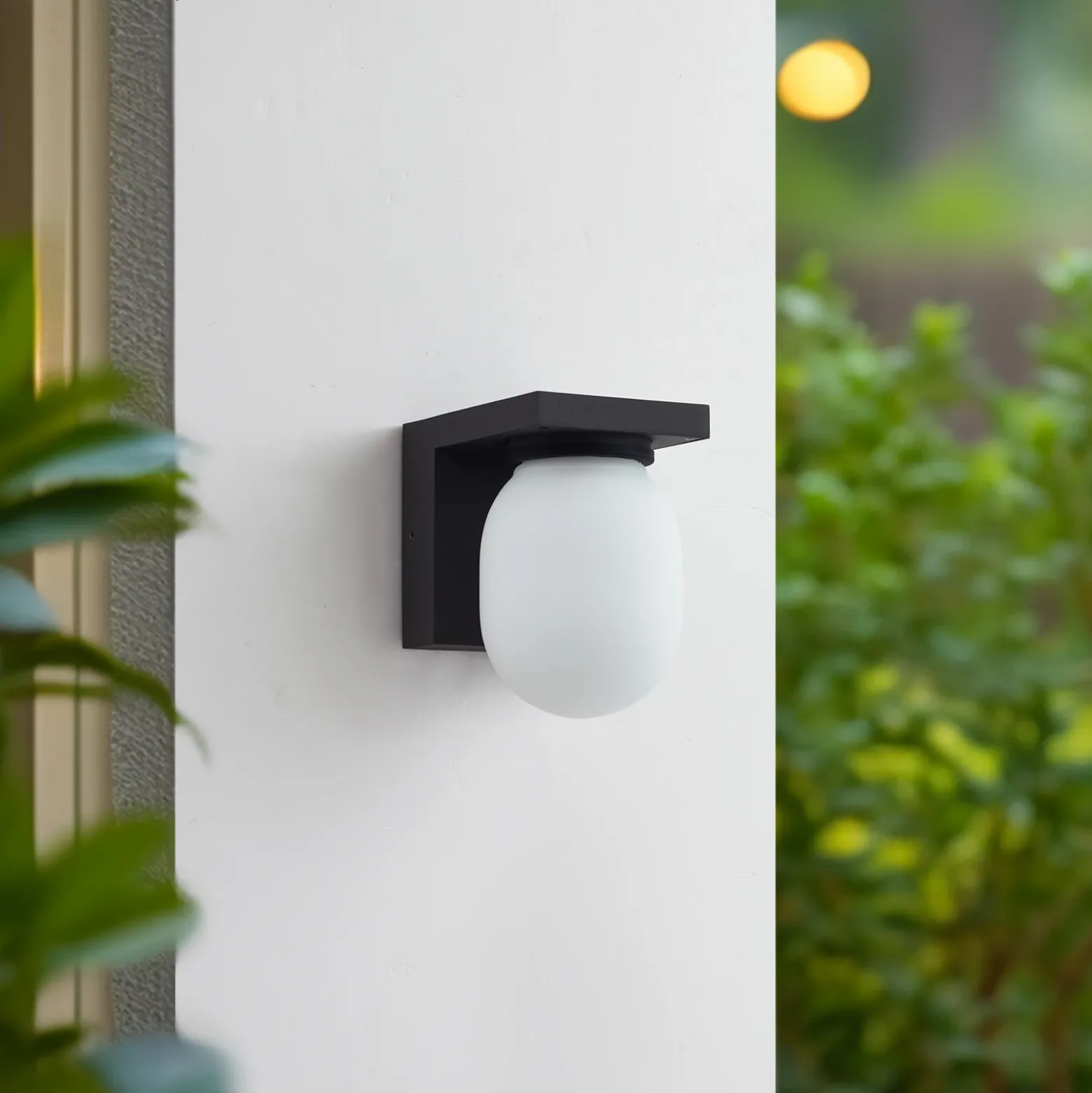 Aplique de exterior Lucande Ovaali, cristal, gris oscuro, IP65