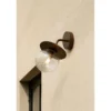 Aplique de exterior Nuura Liila, ancho 16 cm, bronce/transparente