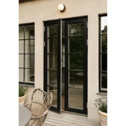 Aplique de exterior Nuura Liila, Ø 16 cm, bronce/ópalo
