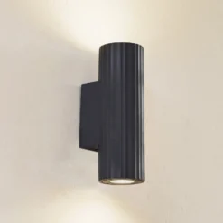 Aplique de pared Christa de Lindby, antracita, hormigón, 25 cm, estriado