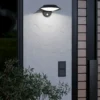 Aplique de pared LED Cerrisi, ancho 10,5 cm, negro, sensor