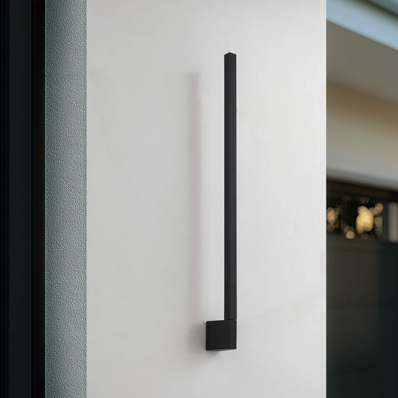 Aplique de pared LED Lindby Neano, 80 cm, negro, metal, IP54