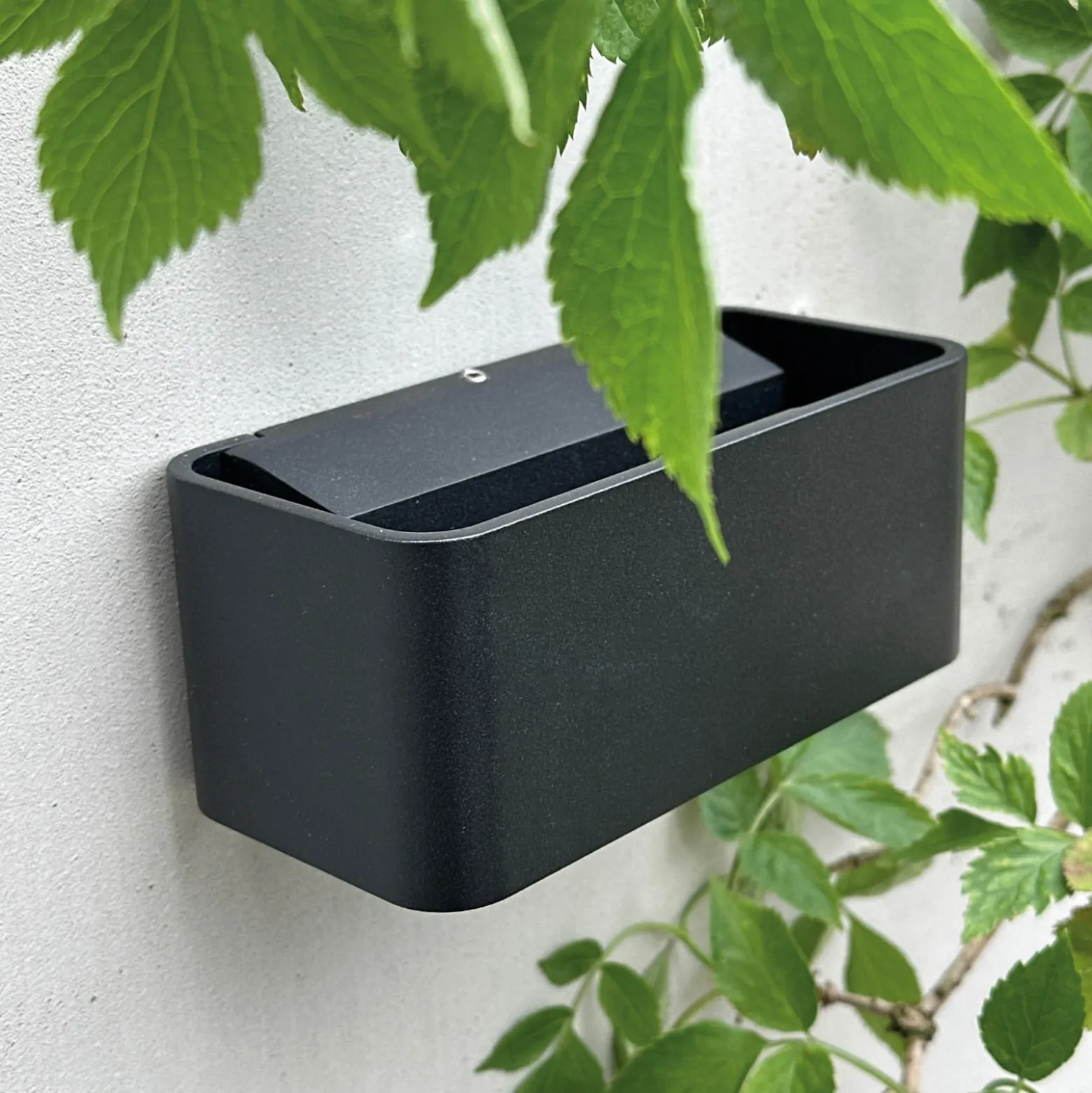 Aplique de pared LED para exterior Saturn de Dyberg Larsen, negro, 14,7 cm