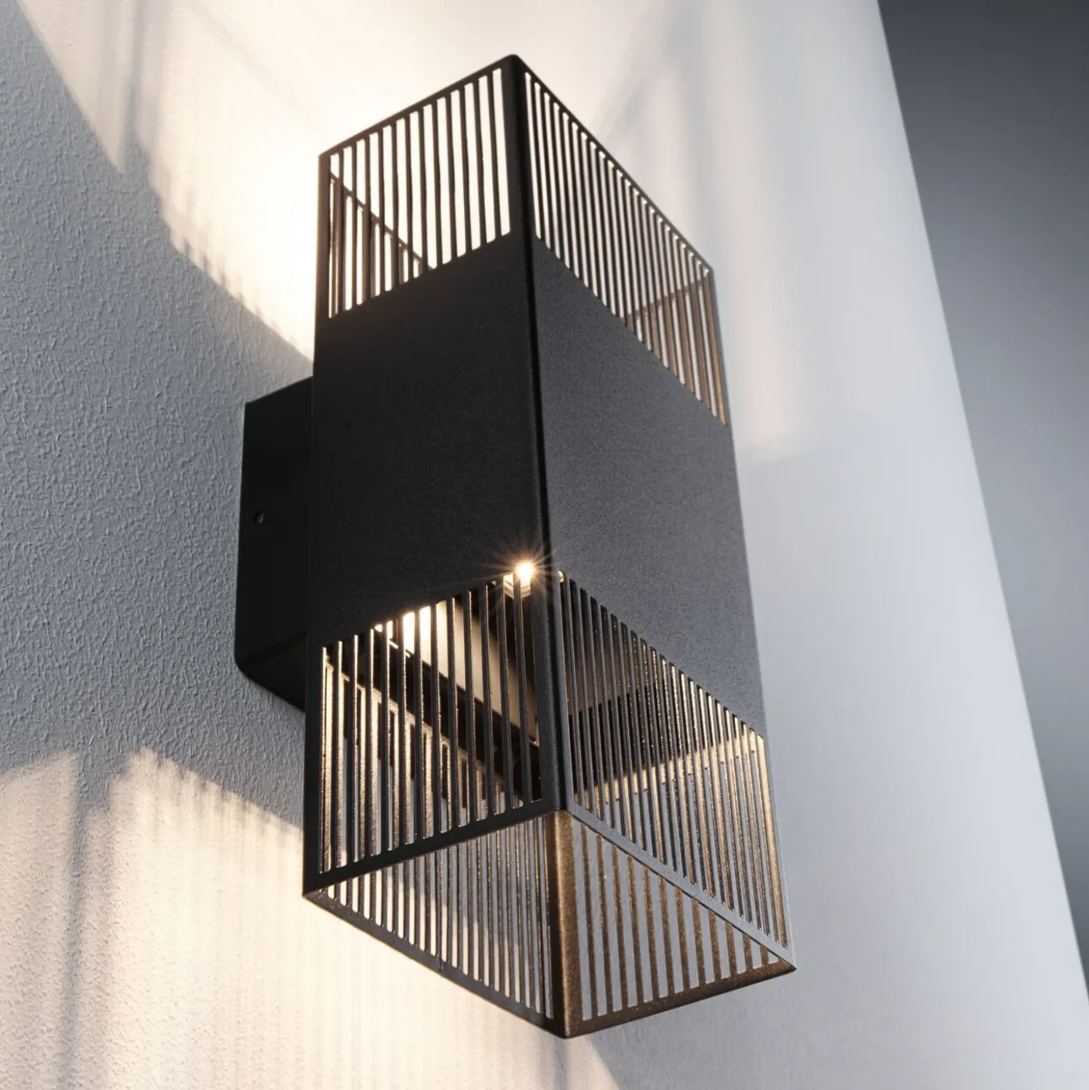 Aplique de pared LED Tharin de Paulmann, 25 cm, negro, luz hacia arriba/abajo,