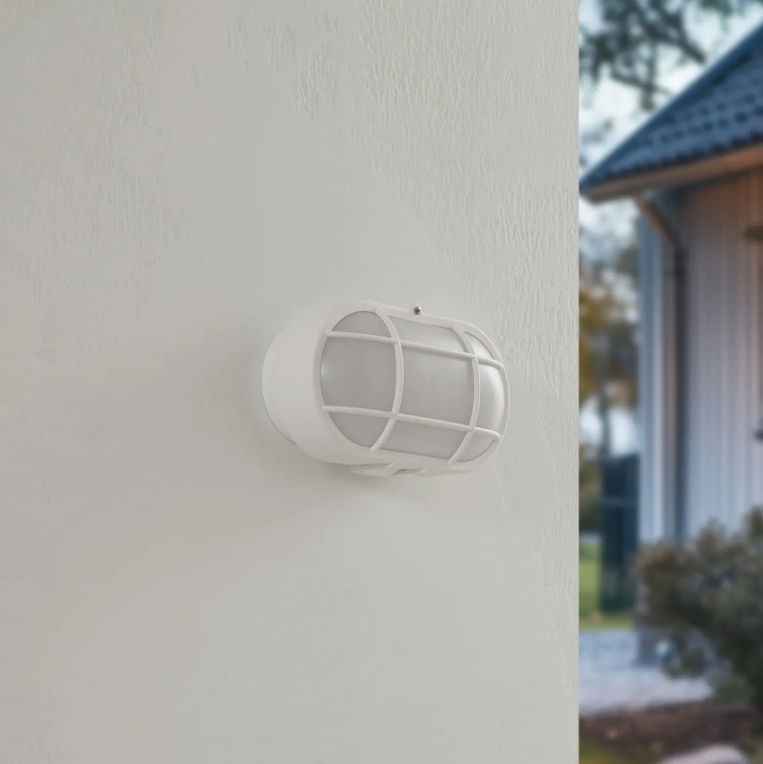 Aplique LED para exterior Alisha de Lindby, blanco, plástico, IP54