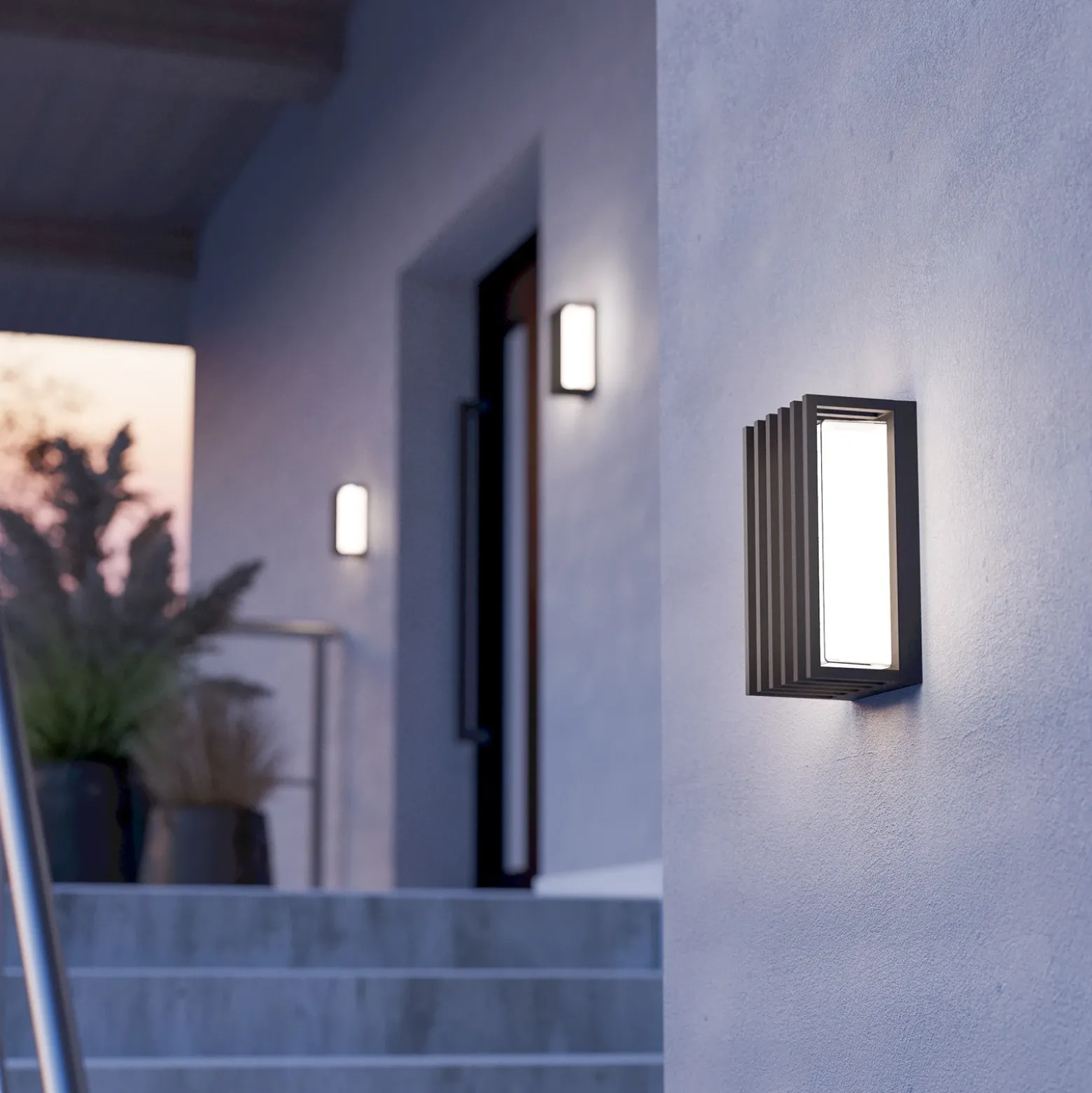 Aplique LED para exterior Genovese, negro, altura 24 cm, con sensor