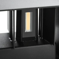 Aplique LED para exterior Lindby Nivar, angular, negro, 20 cm, IP54