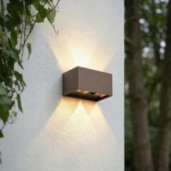 Aplique LED para exterior Lindby Nivar, angular, color óxido, 20 cm, IP54