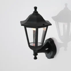 Aplique LED para exterior Lindby Iavo, negro, farol, 38 cm