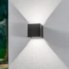 Aplique LED para exterior Lindby Nivar, angular, negro, 10 cm, IP54