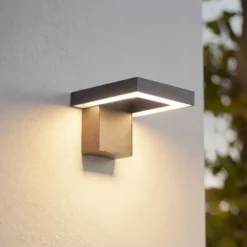 Aplique LED para exterior Lindby Orbin, gris, inclinable, CCT, IP54