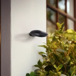 Aplique LED para exterior LOOP de Lucande, negro, IP44, metal
