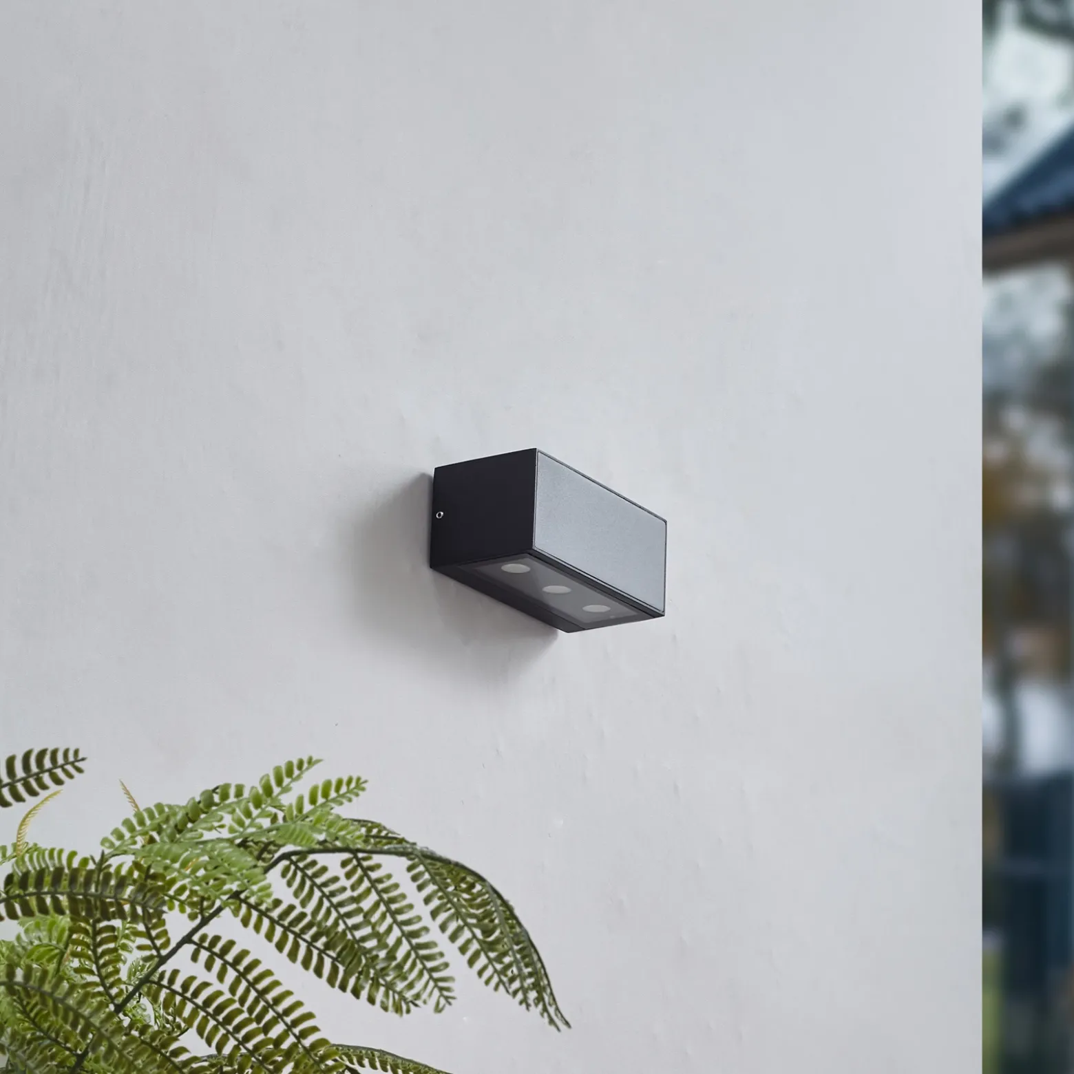 Aplique LED para exterior Lucande Selim, longitud 15,3 cm, negro
