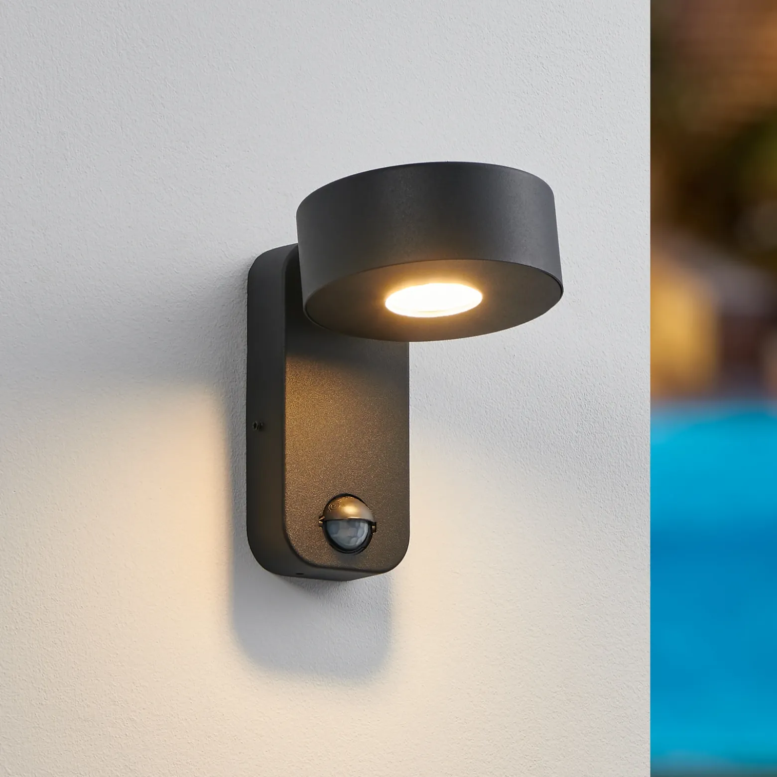 Aplique LED para exterior Palosco, negro, altura 17 cm, metal, con sensor