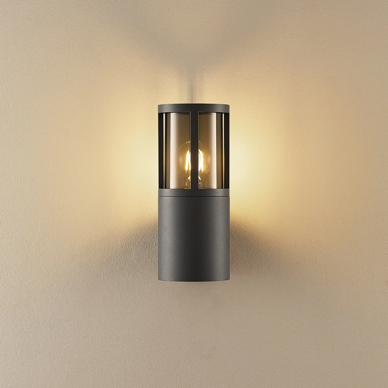 Aplique para exterior Facado II, gris/gris humo Ø 11 cm IP65 metal
