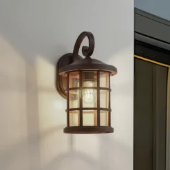 Aplique para exterior Lindby Ankea, óxido/ámbar, 37 cm, IP23, E27