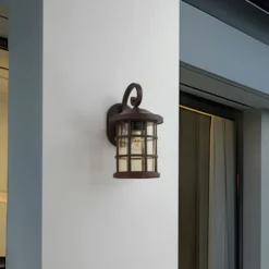Aplique para exterior Lindby Ankea, óxido/ámbar, 37 cm, IP23, E27