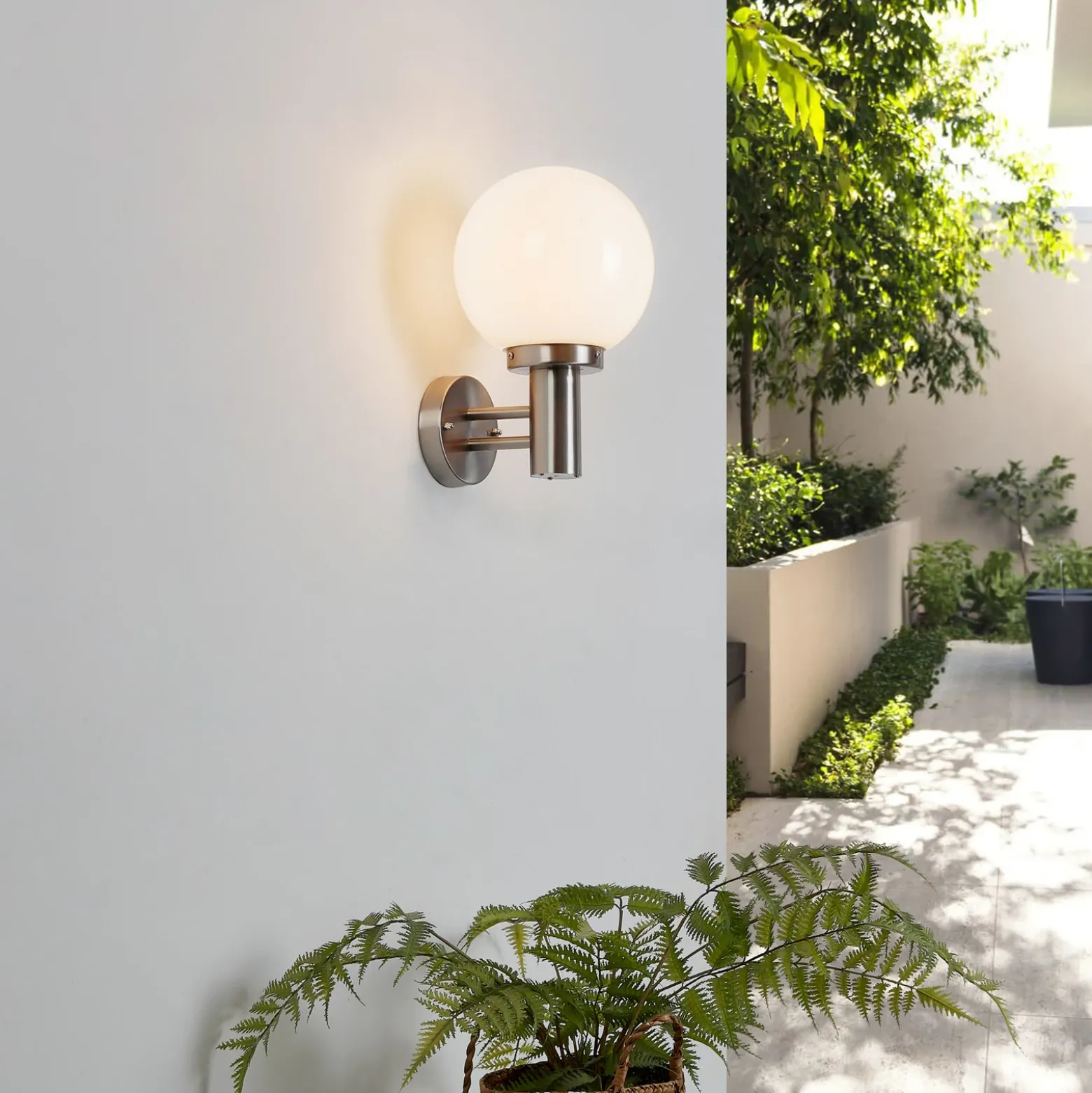 Aplique para exterior Nada de Lindby, acero inoxidable, cristal, 32 cm de