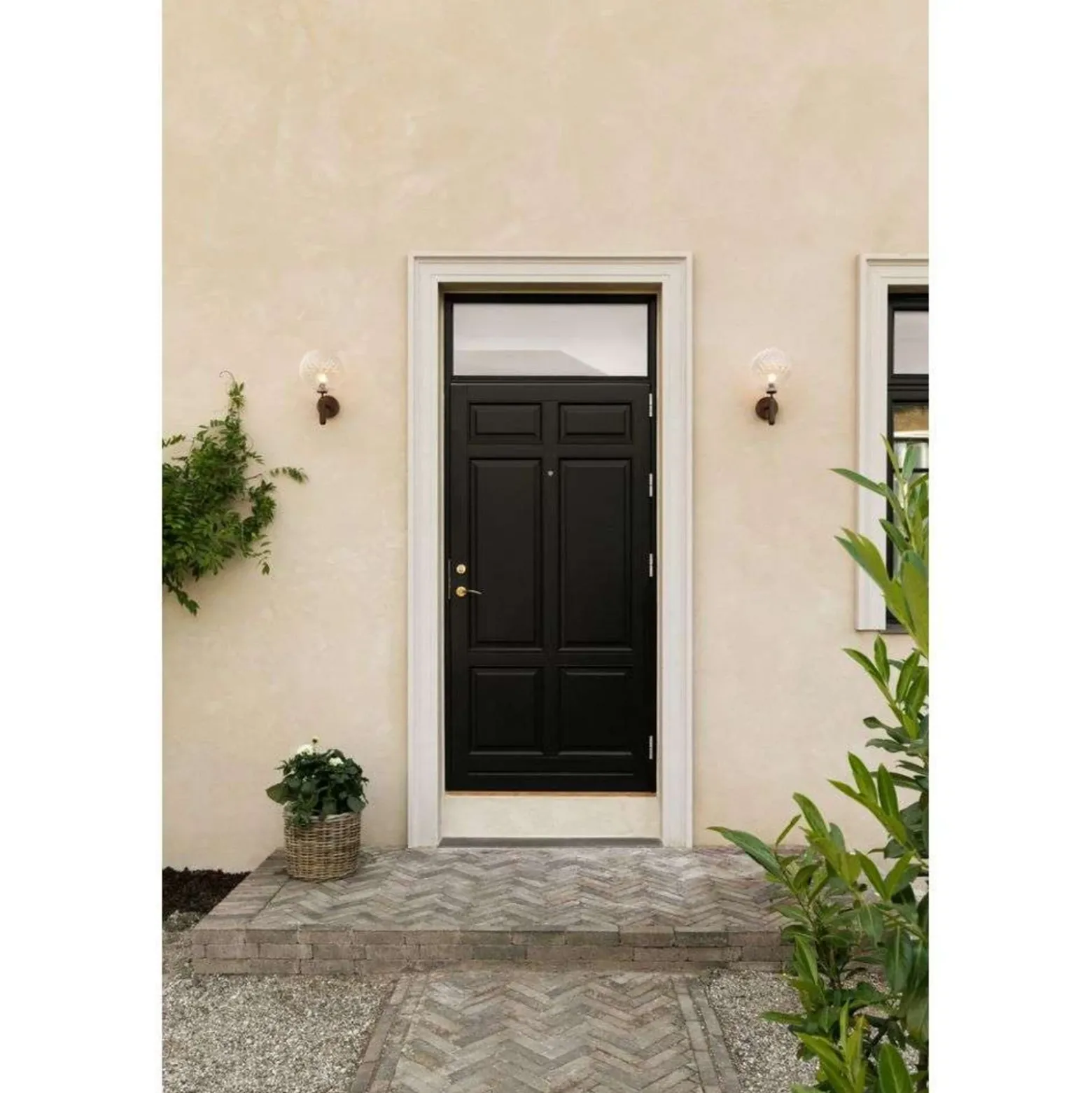 Aplique para exterior Nuura Miira, Ø 20 cm, bronce oscuro/transparente