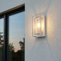 Arcchio Aplique de exterior Ismera, blanco, IP65, cristal, E27