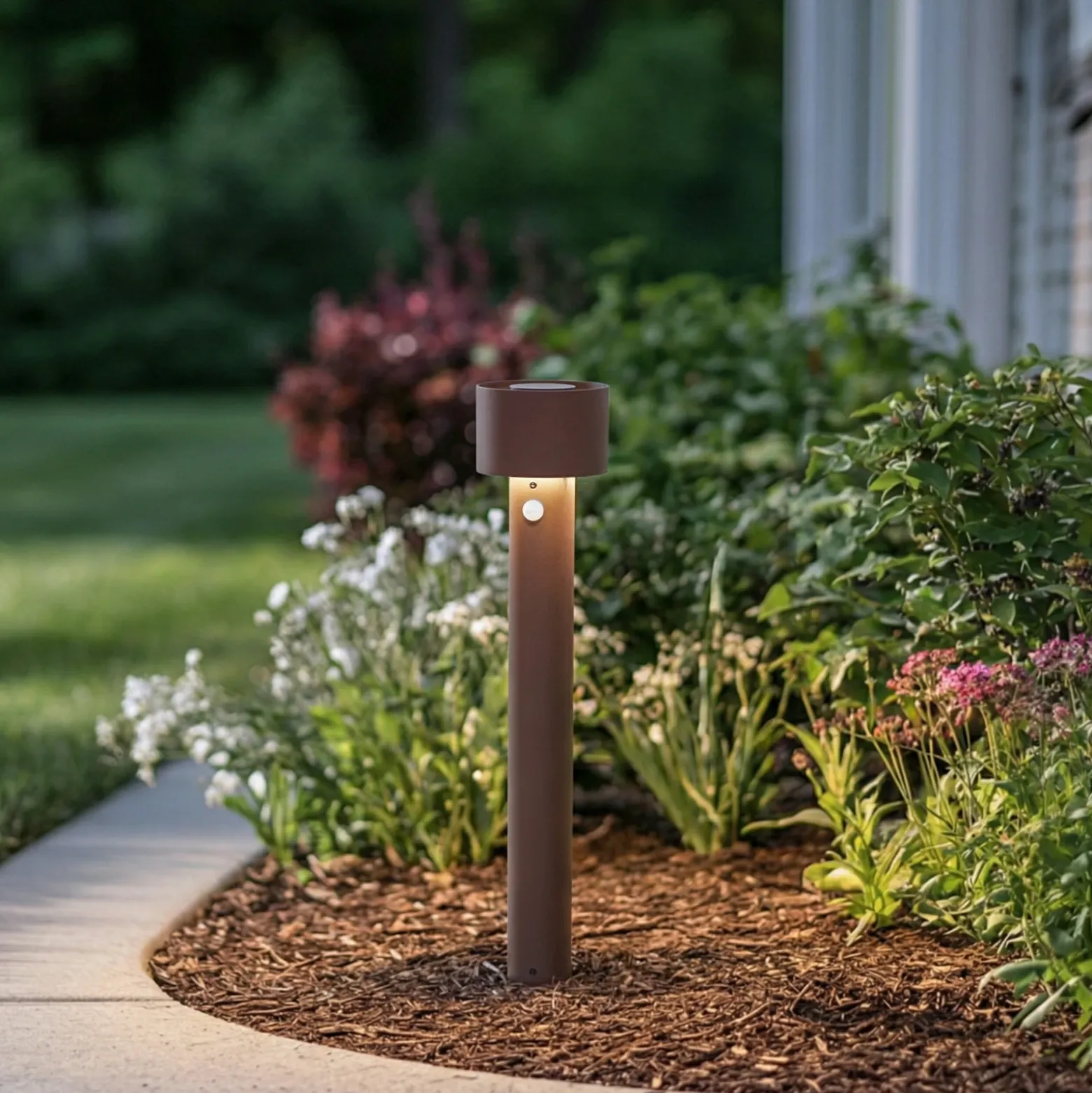 Bolardo luminoso LED Arcchio Milten, 65 cm, color óxido, IP65, con sensor