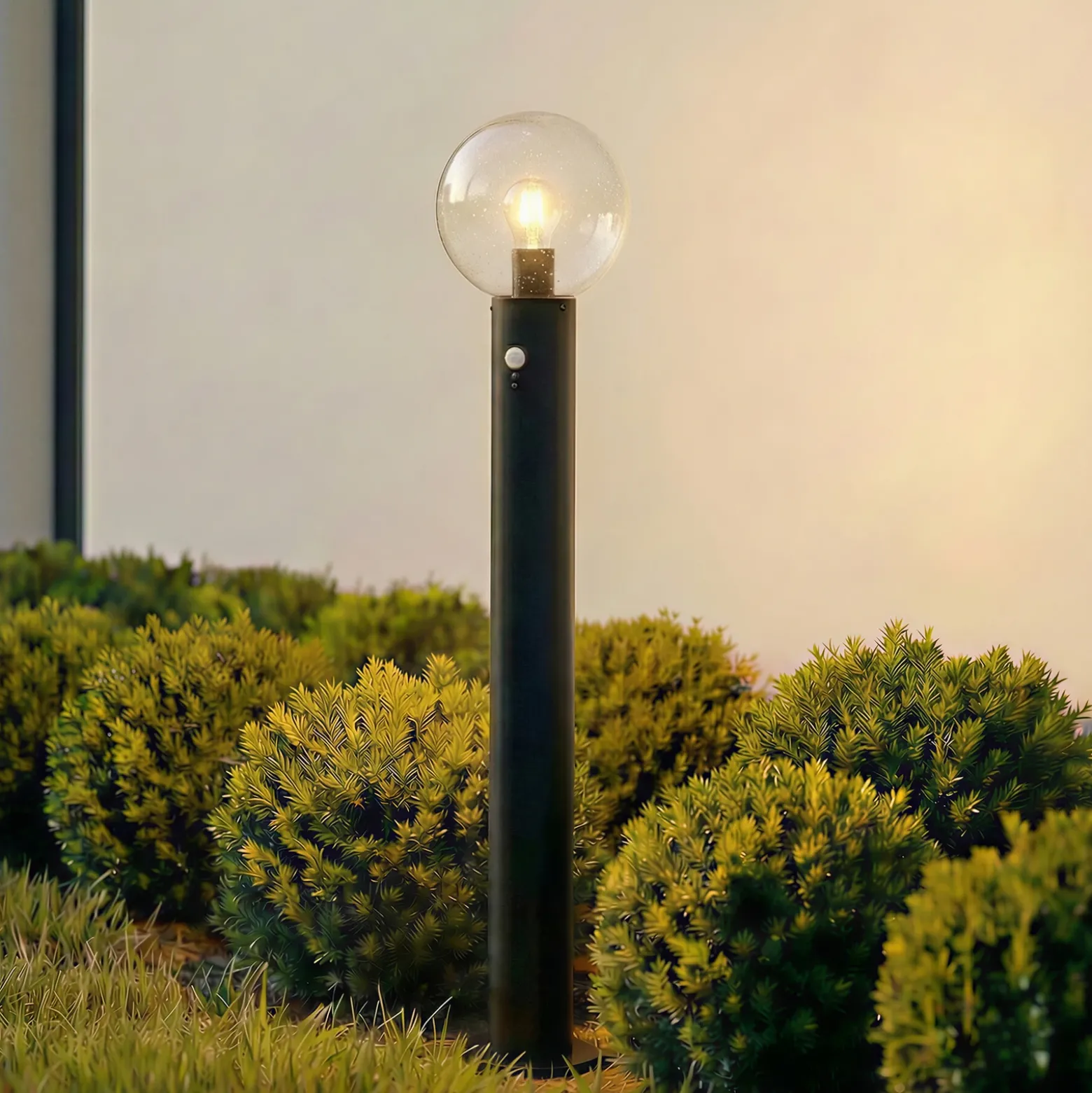 Bolardo luminoso Lindby Dangan, transparente, 90 cm, cristal, sensor