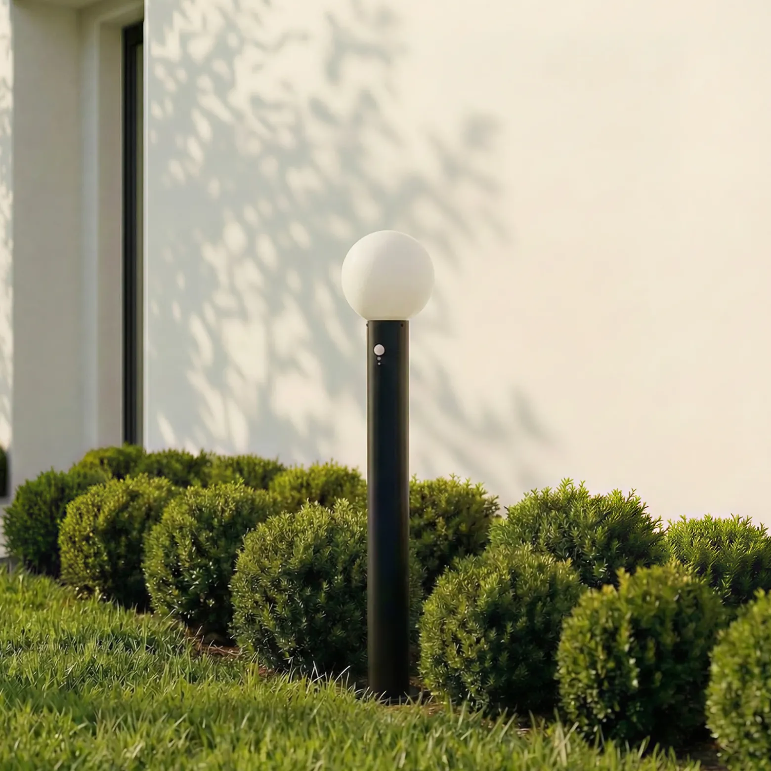 Bolardo luminoso Lindby Dangan, negro/blanco, 90 cm, cristal, sensor