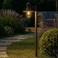 Bolardo luminoso Lindby Eloretta, óxido, 110 cm, acero, IP44, E27