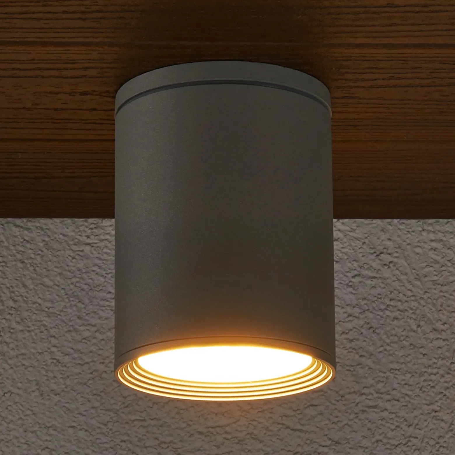 Foco de exterior Lucande Minna, plateado, 14 cm, IP54, E27