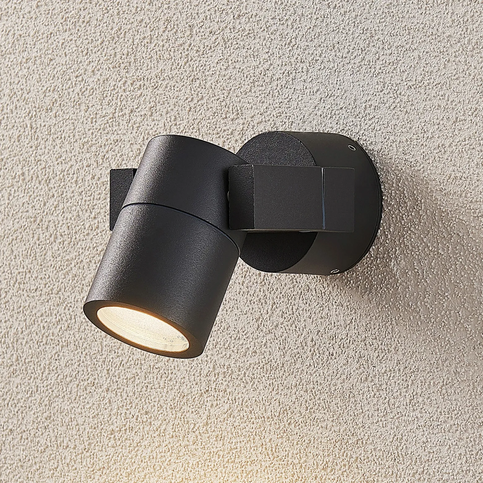 Foco de pared exterior Lucande Kavuna, redondo, antracita, IP54