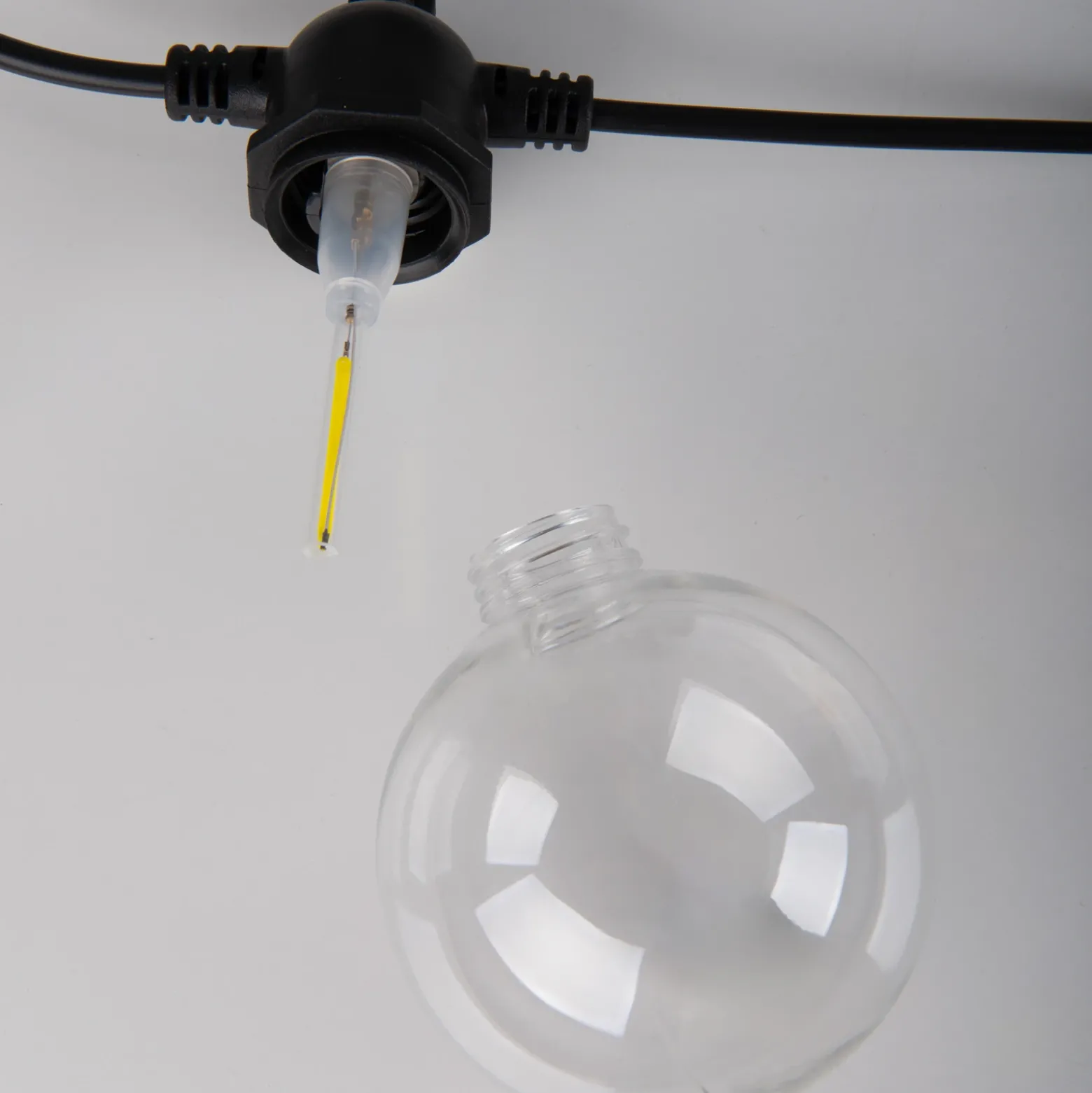 Guirnalda de luces LED solar CADENA, 2500 K, negra, 10 luces, 5 m