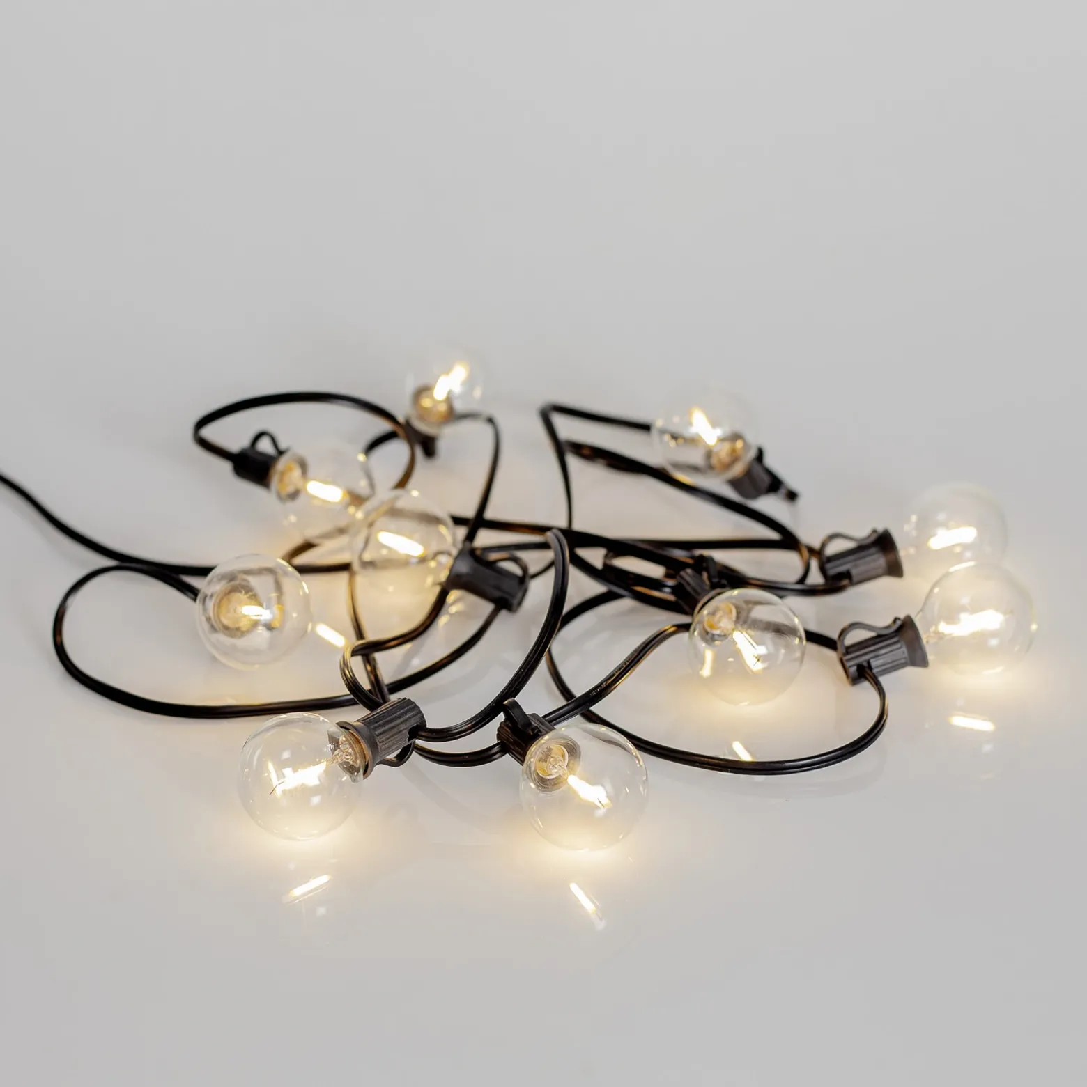 Guirnalda de luces LED solares Globe Mini, 10 luces, 270 cm, 3000 K