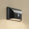 Lindby aplique LED para exterior Siana, negro, PC, sensor