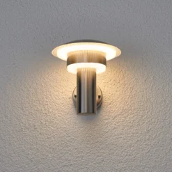 Lindby Aplique LED para exterior Lillie, altura 19 cm, acero inoxidable