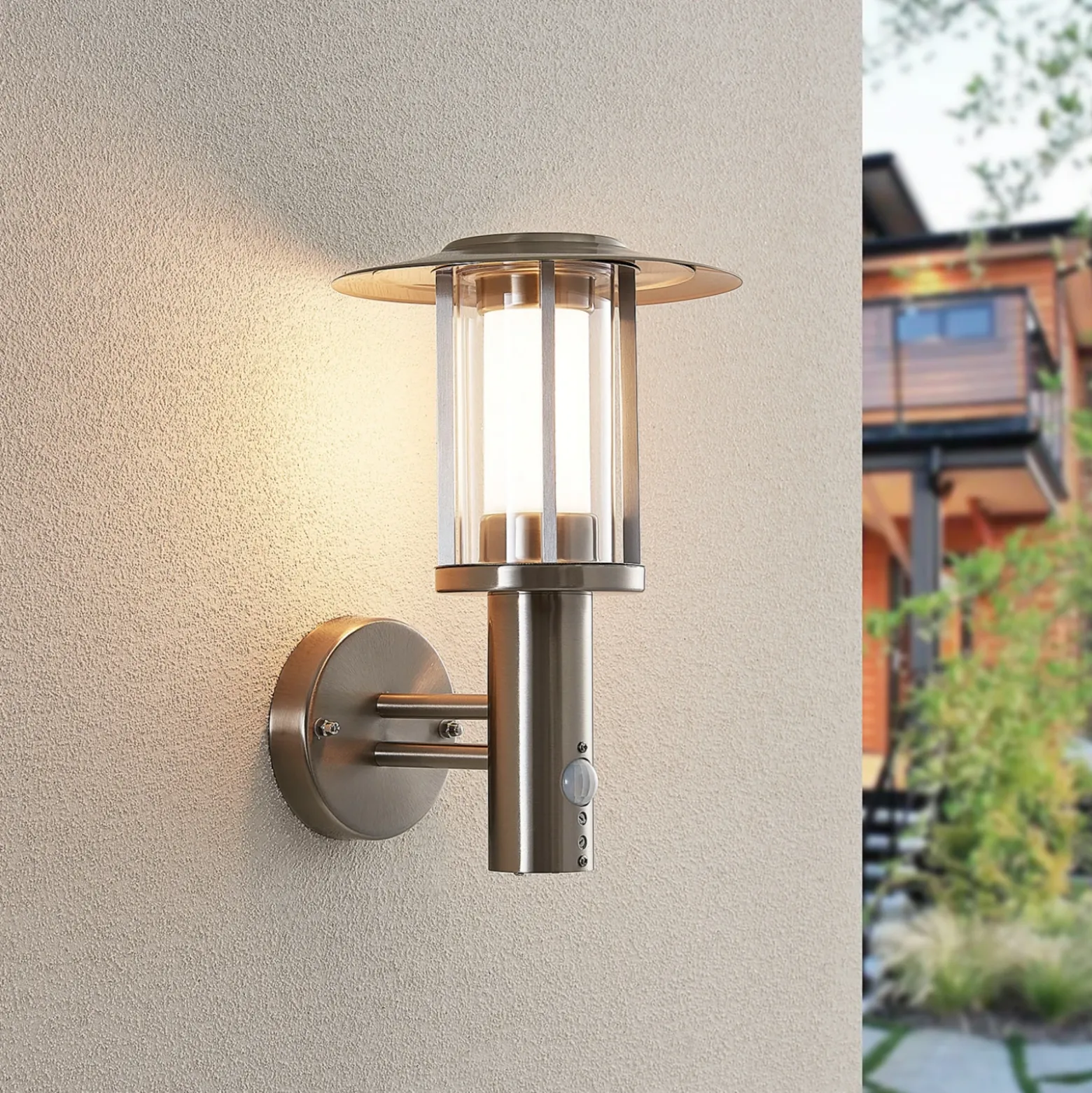Lindby Aplique LED para exterior Gregory, sensor, acero inoxidable, IP44
