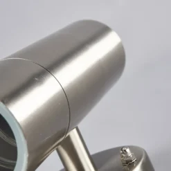 Lindby Aplique para exterior Hakan, arriba/abajo, acero inoxidable, IP44, GU10