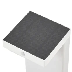 Lindby Baliza LED solar para zócalo Eleazar, blanca, aluminio, sensor