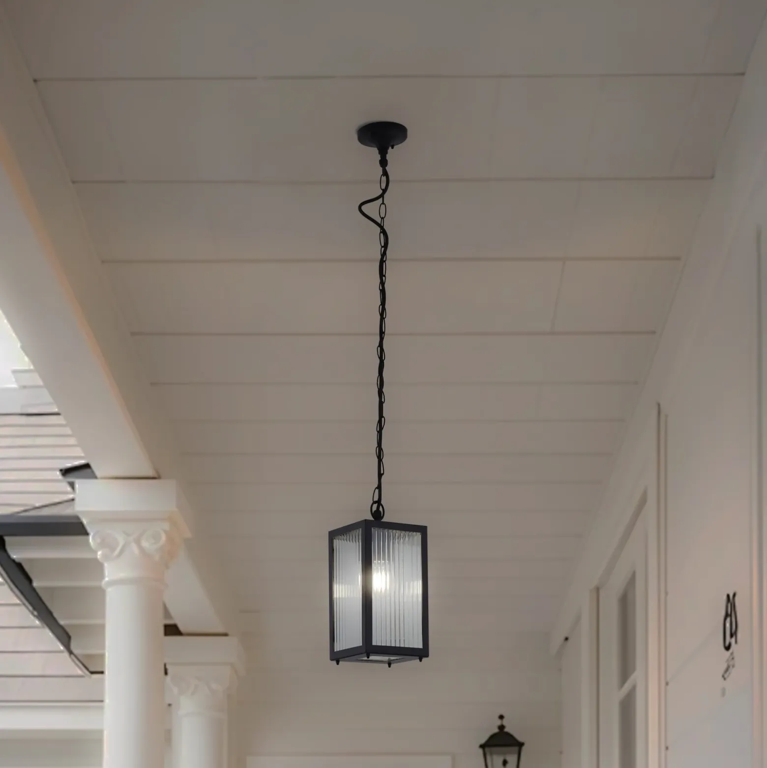 Lindby Lámpara colgante exterior Bolgar, negro, metal, cristal