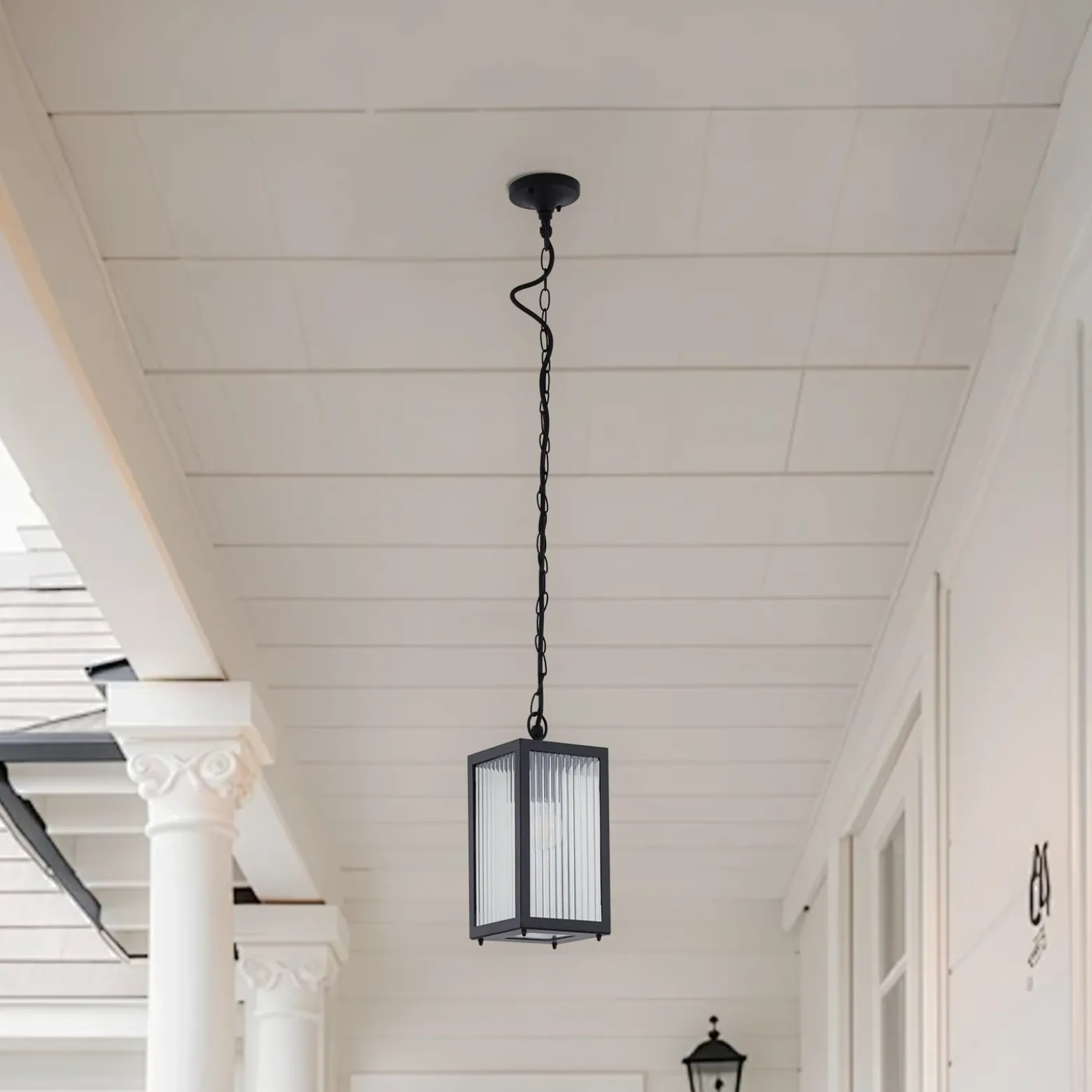 Lindby Lámpara colgante exterior Bolgar, negro, metal, cristal