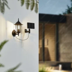 Lindby Lámpara solar LED de pared Sayata, negra, aluminio, farolillo