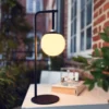 Lámpara decorativa recargable LED Odin de Dyberg Larsen, negro/blanco, IP44